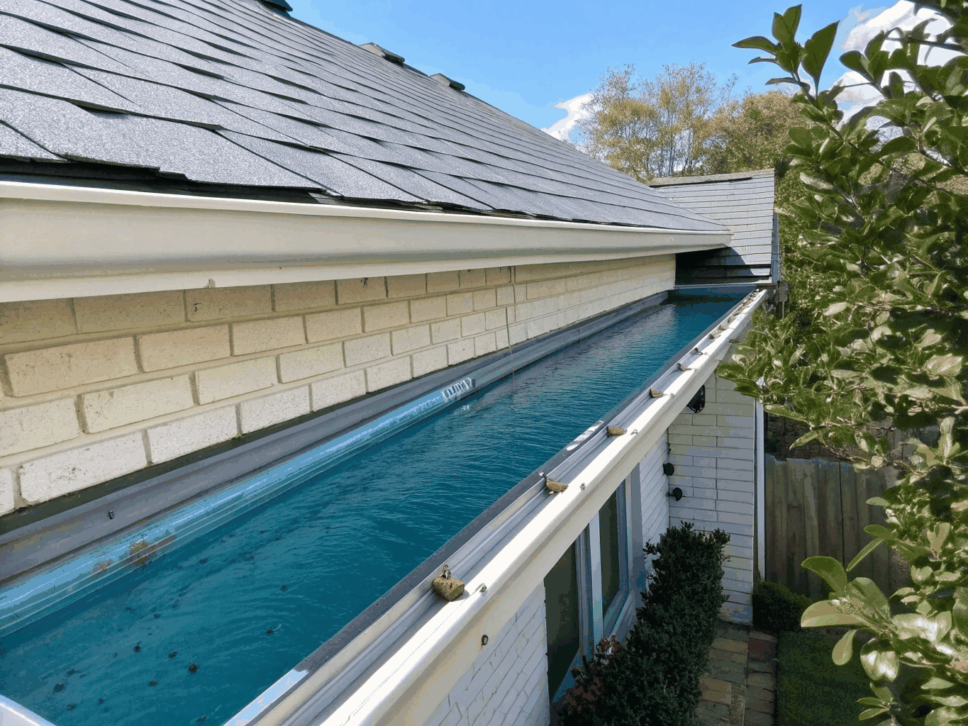 New seamless gutters installed on a modern home