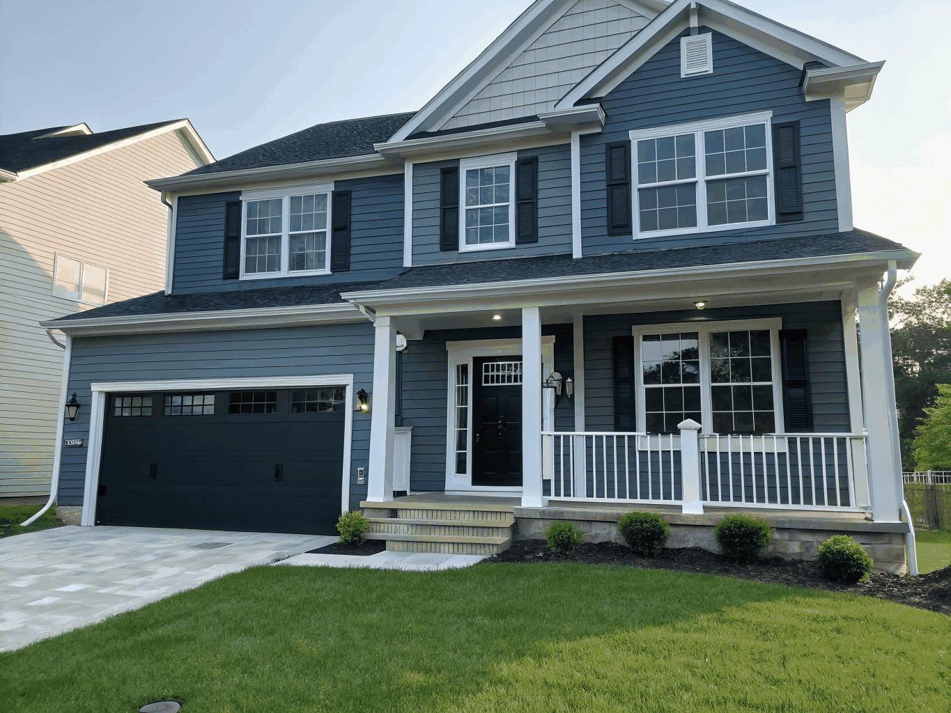 Traditional Cape Cod after siding replacement