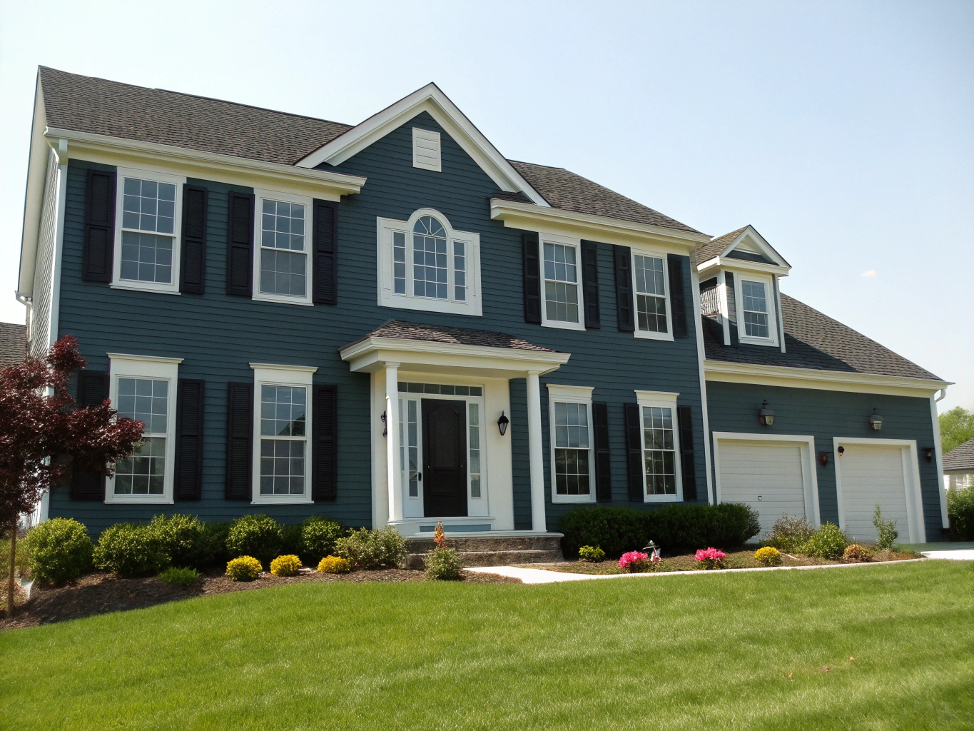 Modern Colonial before siding replacement